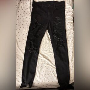 BLACK RIPPED SKINNY JEANS